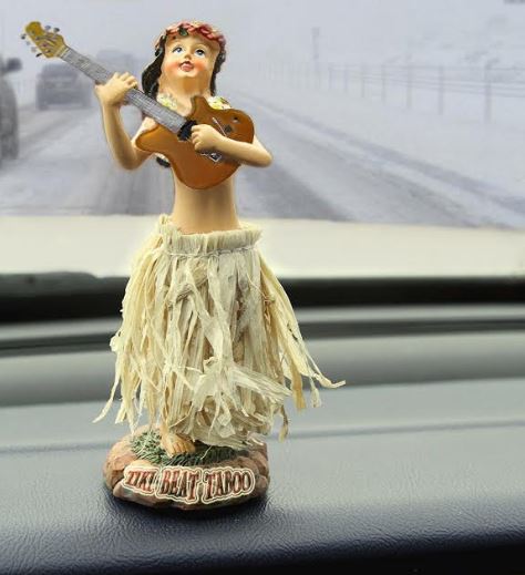 Gregory T.S. Walker and Tiki Beat Taboo picture of Hawaii ornament of girl playing guitar.