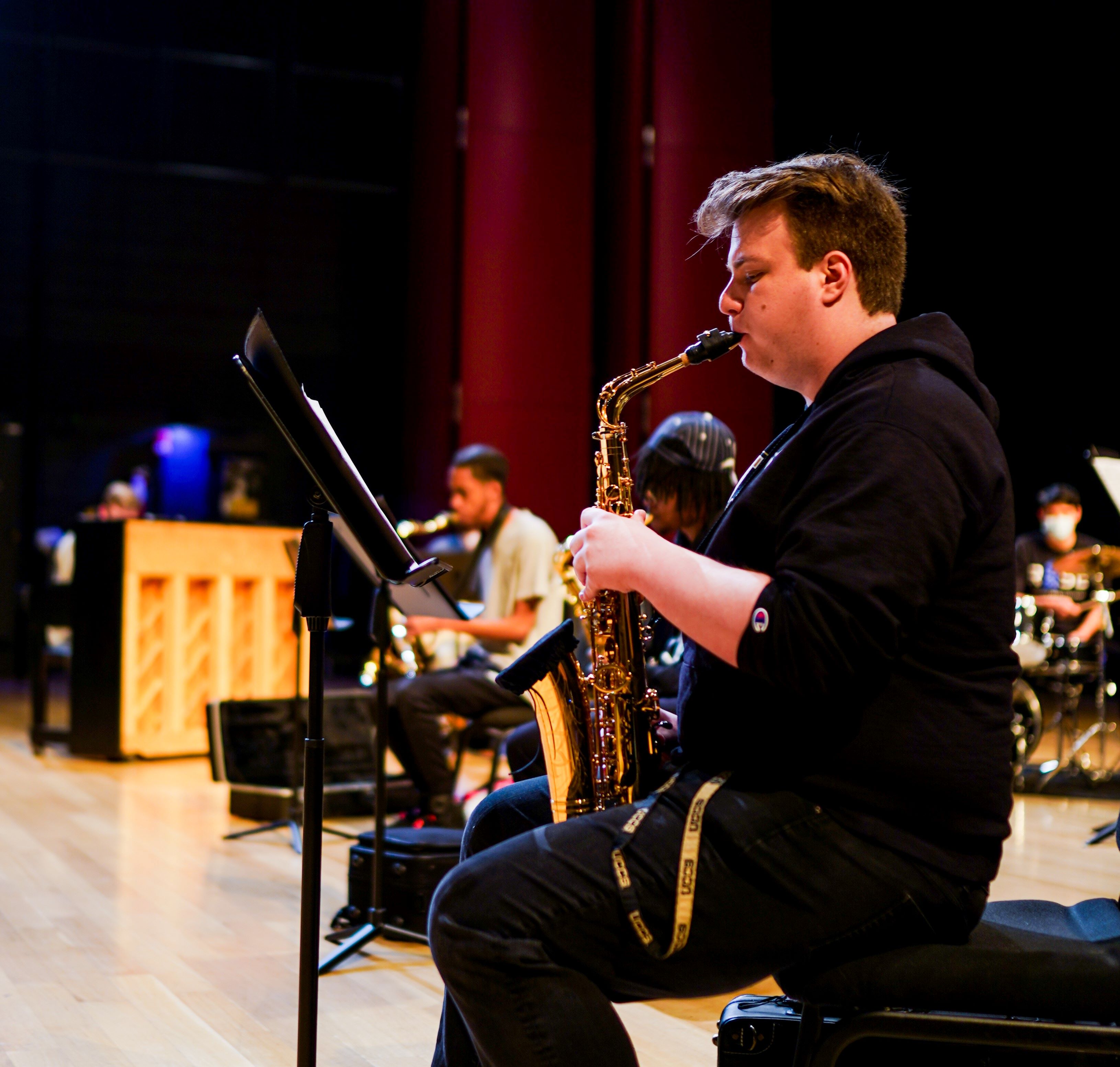 saxophonist with jazz ensemble