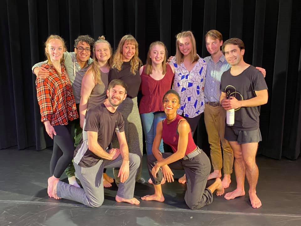 people posing for photo in dance studio