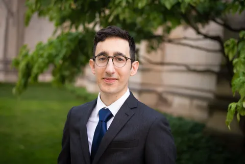 Michael DiBarry standing in front of scenery