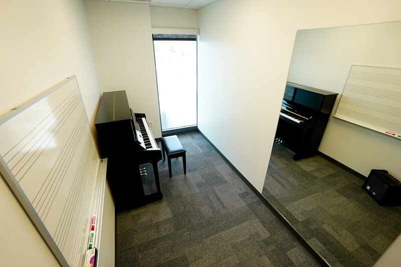 music program practice room with piano